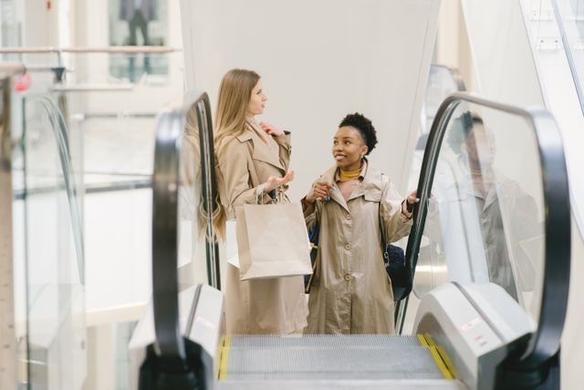two people on an escalator