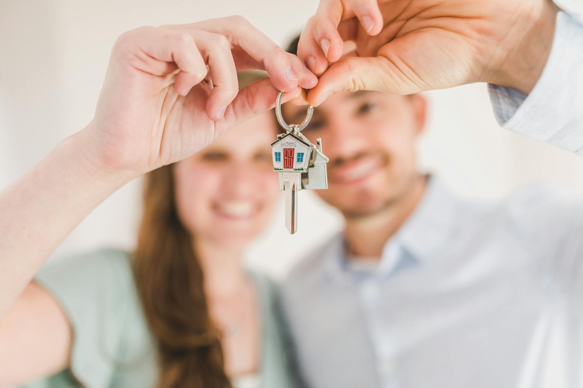 happy couple with house key